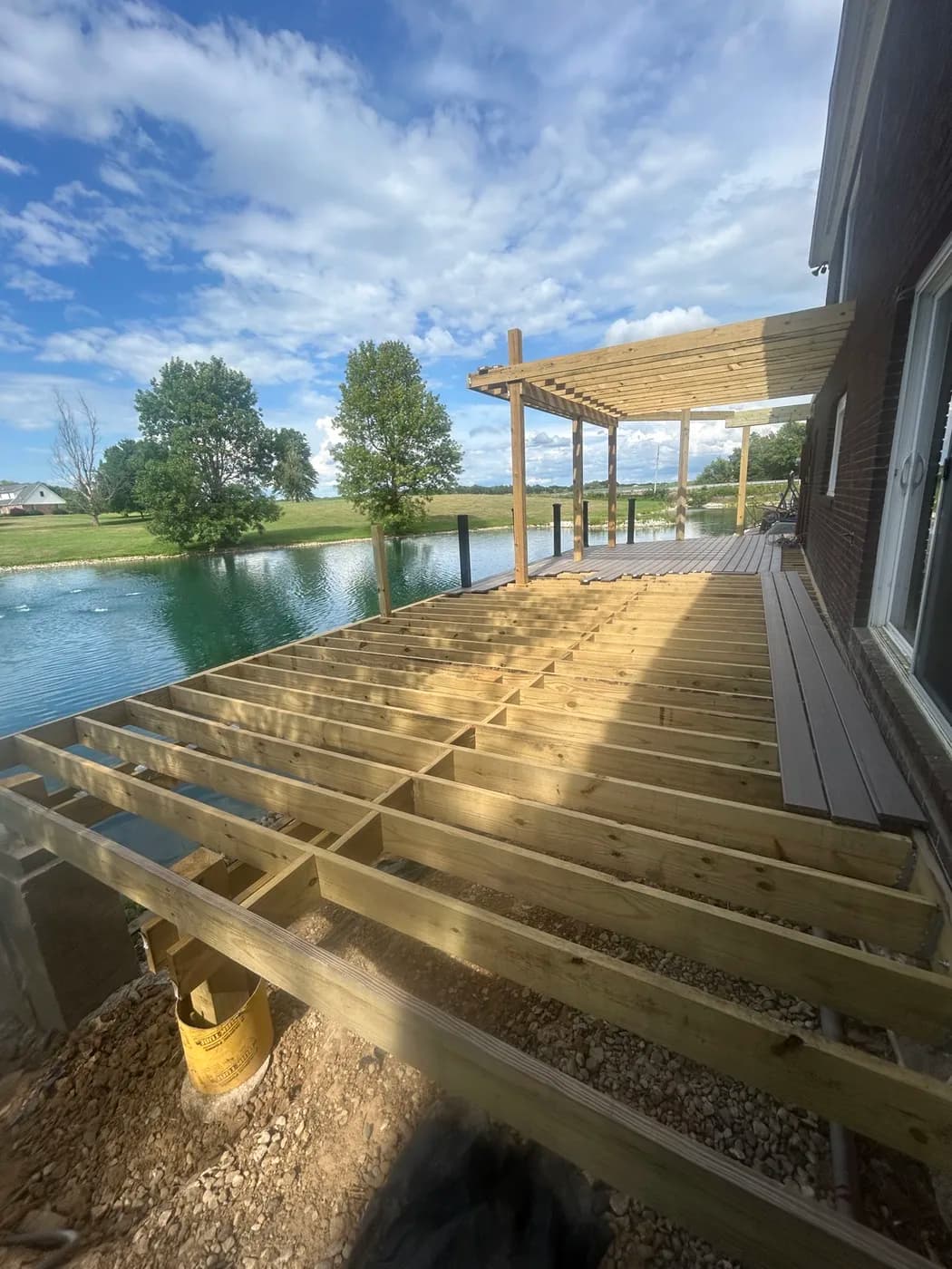 Deck framing and joist work in progress on a new build